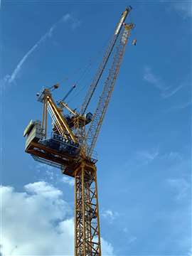Worlds-first-Potain-MR-229-luffing-jib-crane-erected-in-London-UK