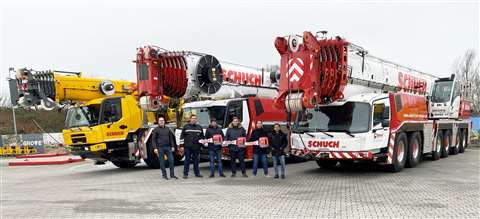 three all terrain Grove cranes lined up at a handover to Schuch Heavylift